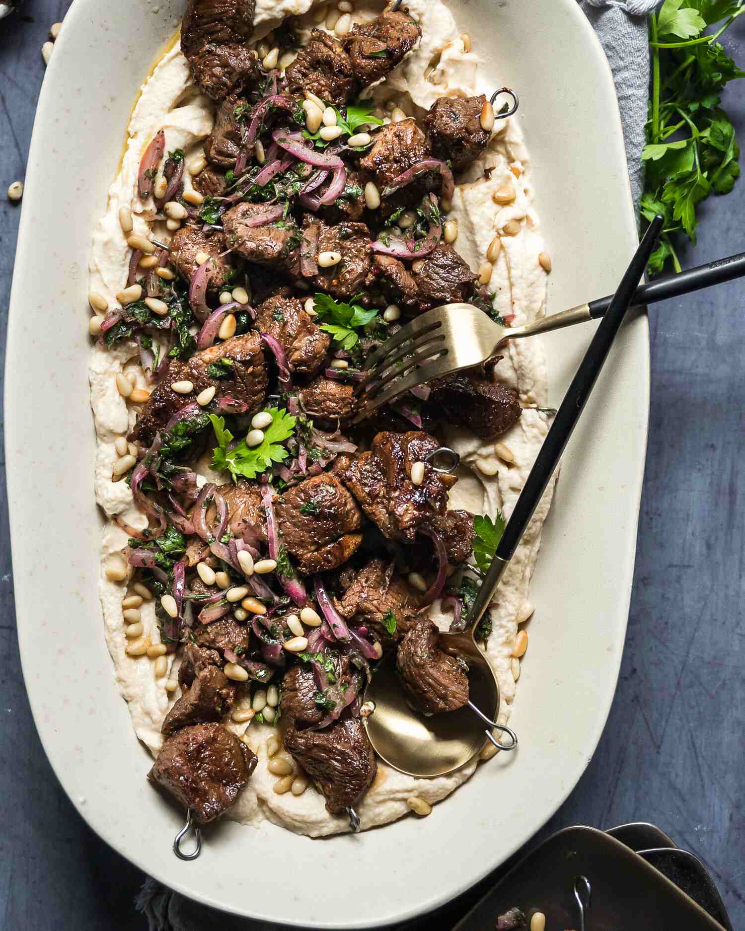 Lamb Skewers over hummus