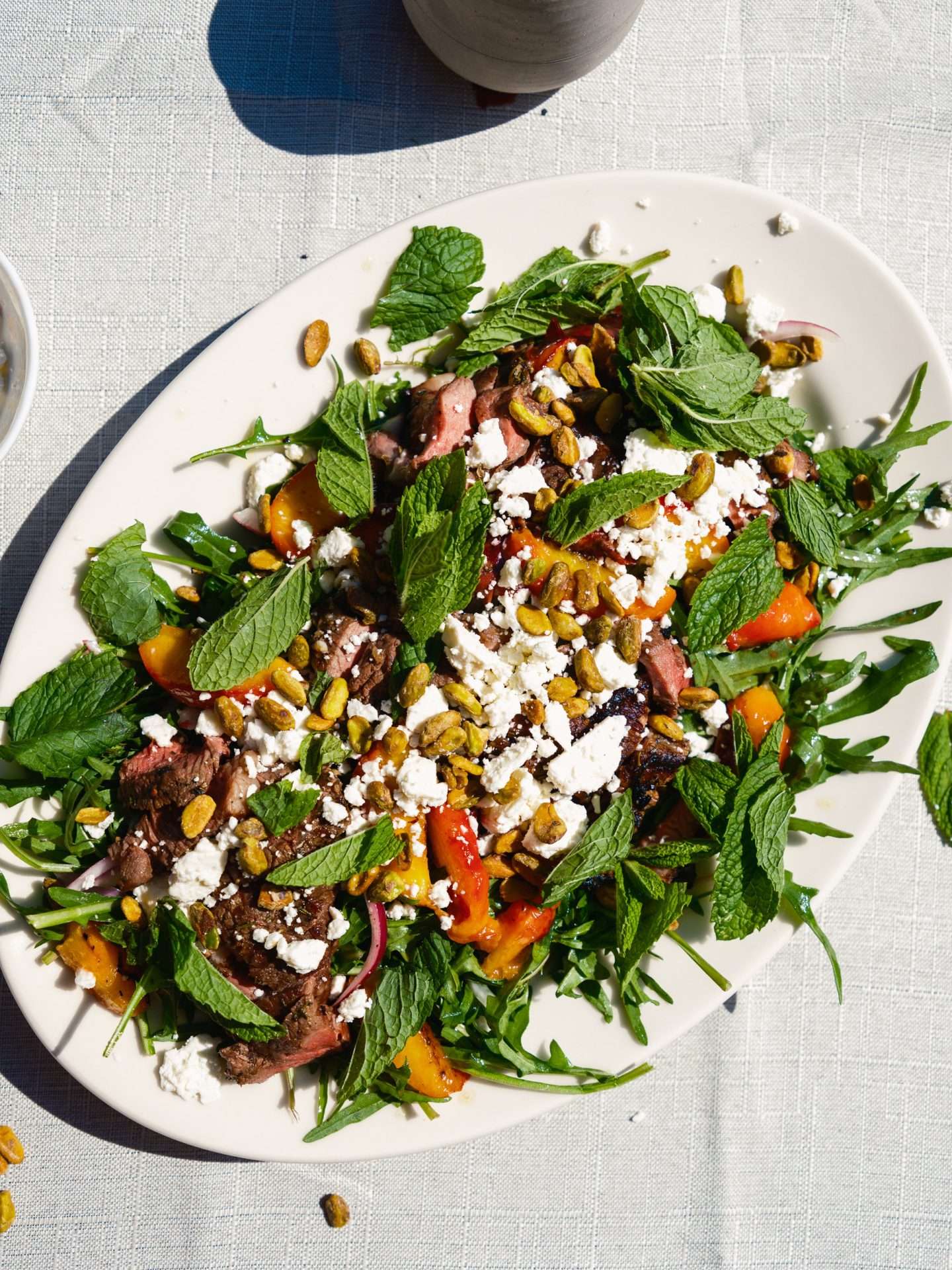 lamb loin chops with cucumber mint salad and sweet and smoky tahini