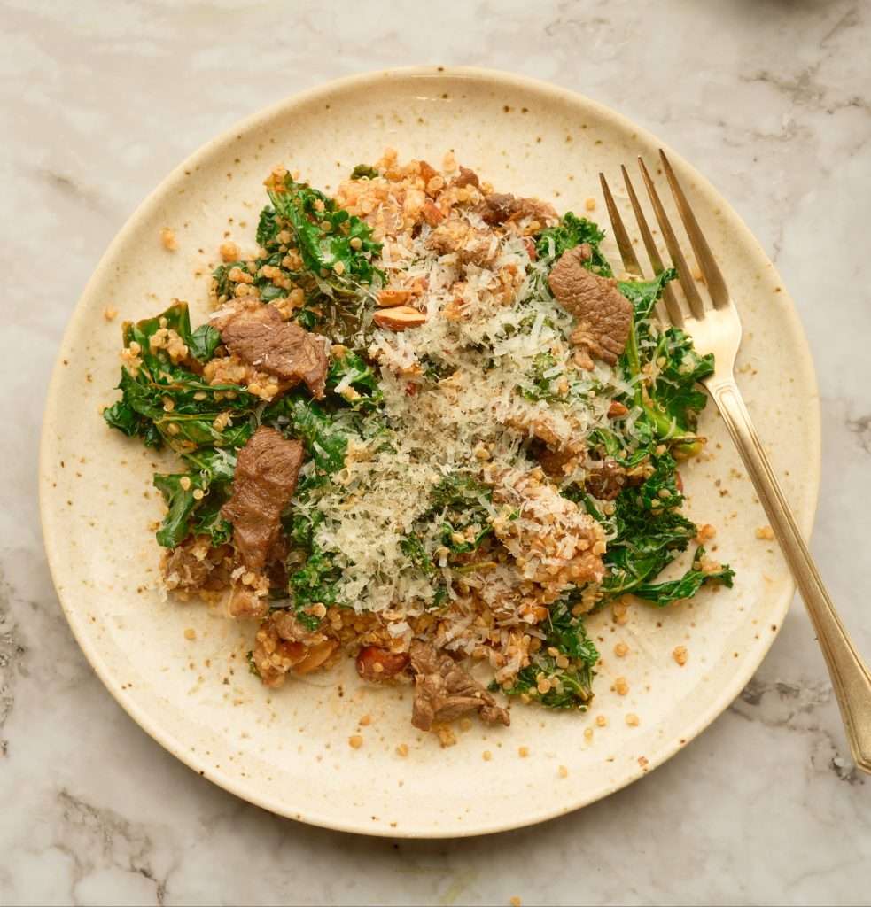 Warm kale salad with american lamb and quinoa